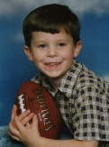 My nephew Kevin posing with a football